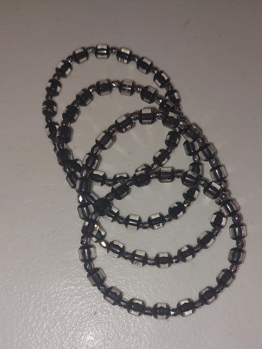 Set Of 4 Black and Silver Tone Stackable Bracelets Unisex 7 Inch Around